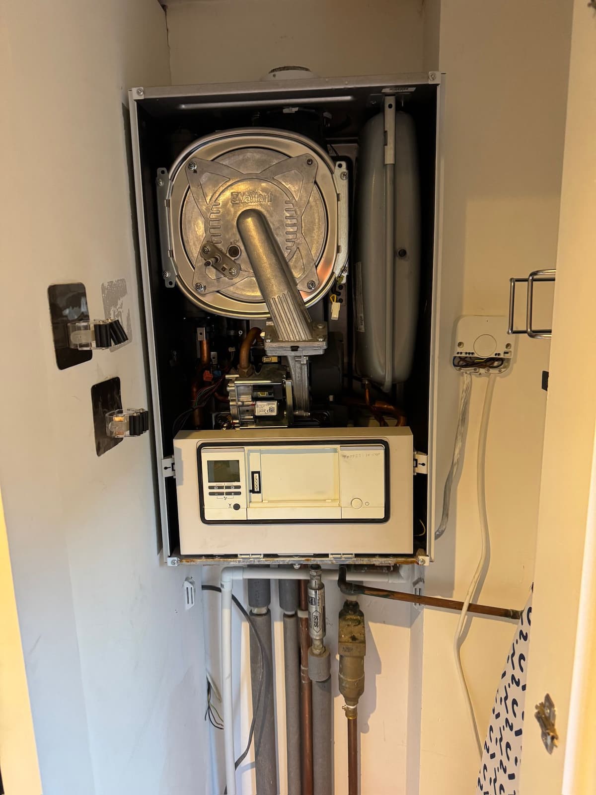 Internal servicing of Vaillant ecoTEC boiler by Platinum engineer in Finchley